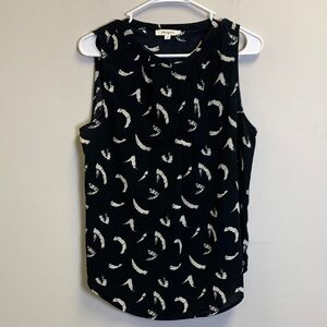 Elegant Black and White Sleeveless Blouse
